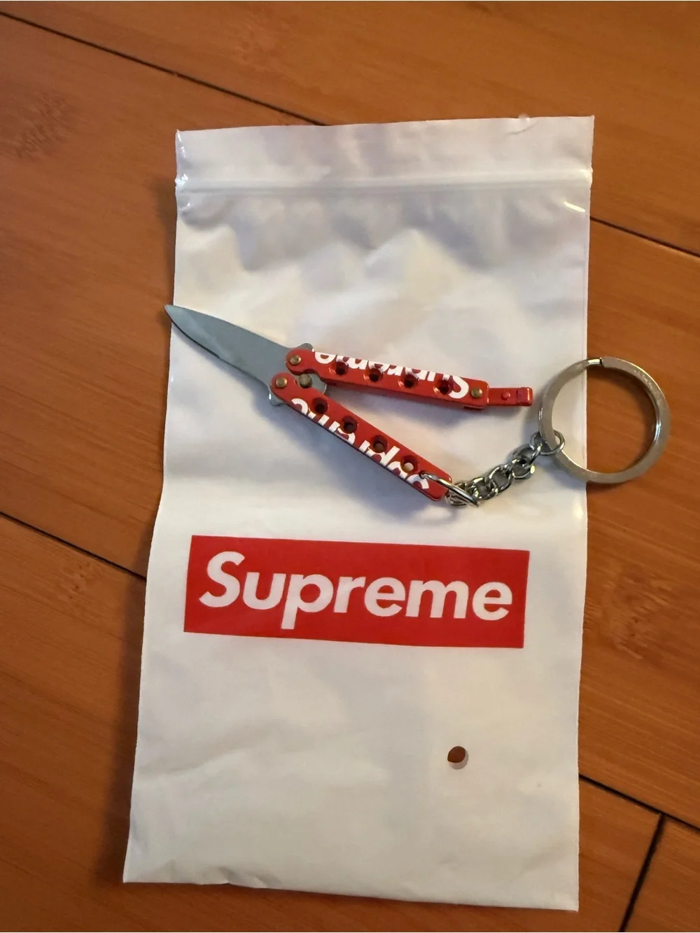 Supreme Red Mini Butterfly Keychain with White Logo